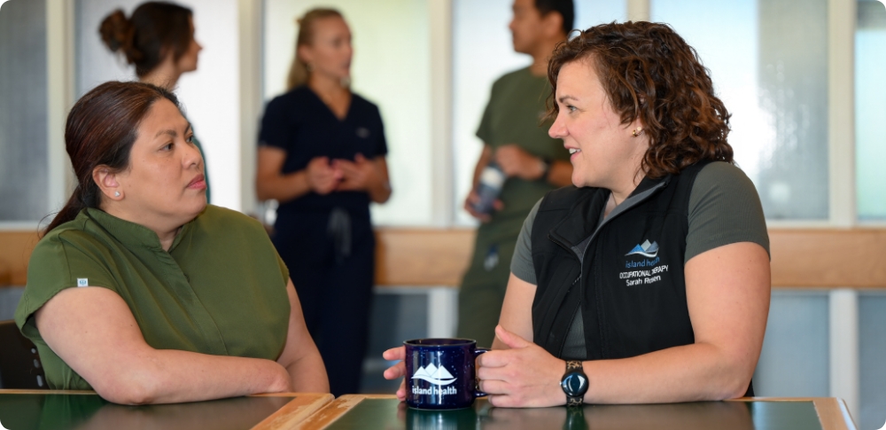 Two island health nurses in conversation